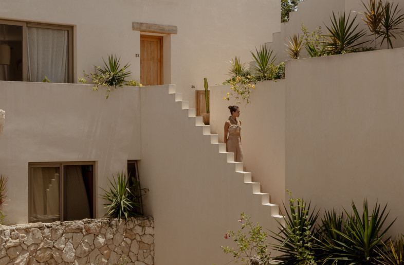 Designed by Mexico City-based RA!, Hacienda Wabi is a 15-apartment complex organized around a fragmented central courtyard, from which residents can access units distributed across three levels. - Ariadna Polo