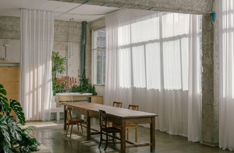 Neutral tones and soft furnishings in natural textures hammer home the tactility of a traditionally domestic space. - Simone Marcolin