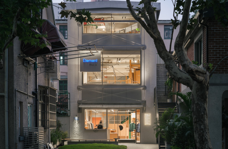 A utilitarian façade becomes the framework for a warm, elemental boutique on Shanghai's Yuyuan Road. - Wen Studio