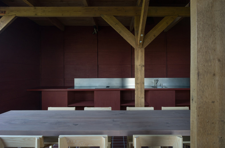 Built-in joinery, crafted from the same oiled wood as the cladding, maintains a minimal aesthetic. - Crispijn van Sas