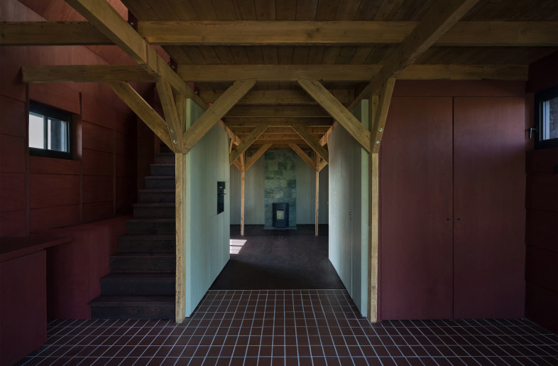 Inside, the transformation begins with a new inner skin constructed from plywood panels treated with linseed oil and pigmented using natural regional tones. - Crispijn van Sas