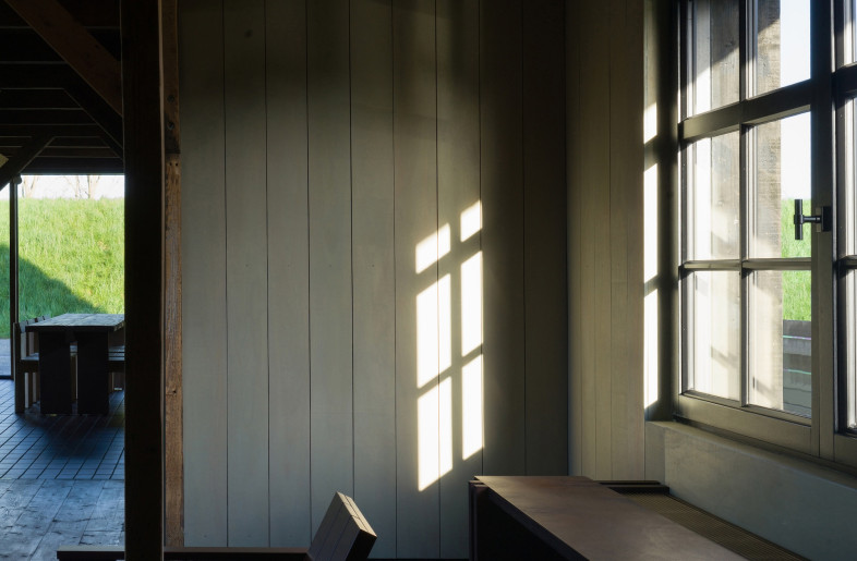 Reclaimed elements, including floorboards sawn from salvaged beams, contribute to the project’s circular ethos. - Crispijn van Sas