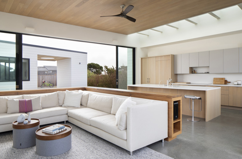 The kitchen, dining, and living room are open and connected as a 'free plan'. - Paul Dyer