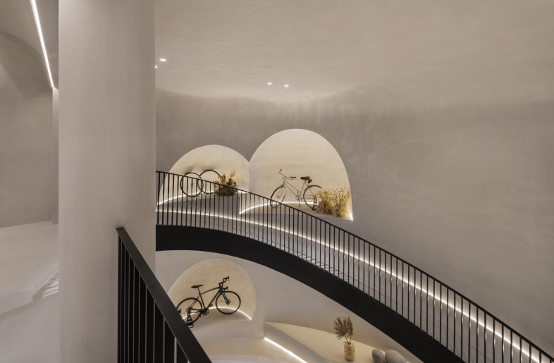 On the way of exploration, we hope to create the different space themes. Through practices and natural techniques, we create a livelier space experience process. The spaces of the two individual underground floors are connected through the circular ramp. Light is vertically introduced to the courtyard. - Design Apartment