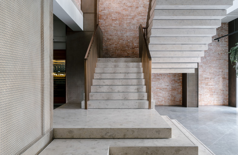 The limestone staircase features generous platforms to serve as a stage with stepped seating. - Photograph by Lit Ma