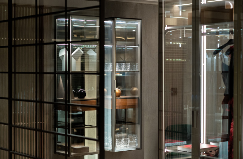 Glass panels and sliding doors wrap around the sumptuous dressing room. - Photograph by Lit Ma