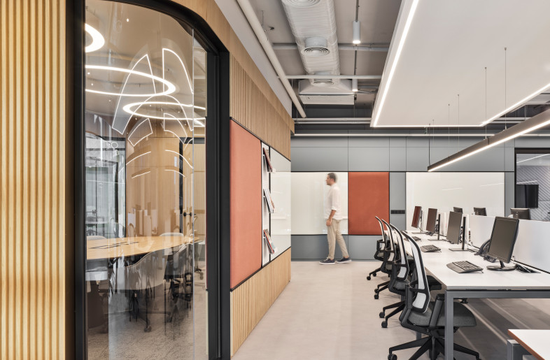 Glazing is used for meeting room partitions to allow natural sunlight in the room. - Photo by Ibrahim Ozbunar https://www.ibrahimozbunar.com/