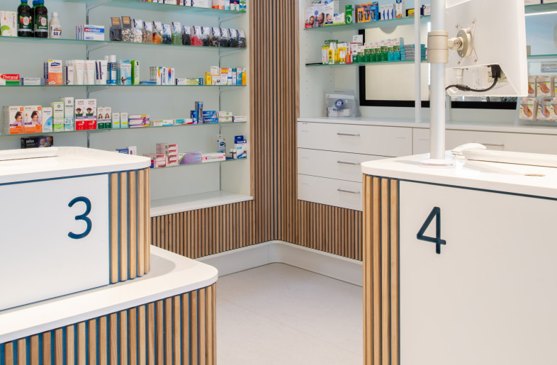 06_Within the service minded identity the design accommodates consultation by creating a shared space for customer and pharmacist - Aiste Rakauskaite