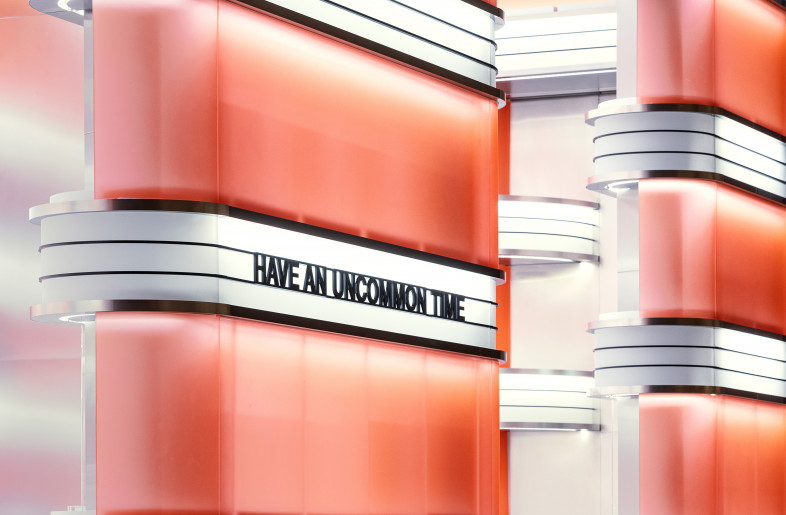 Targeting the dominant consumer group of the future, the design of Uncommon Store is grounded in Retro Futurism. The signature design motifs, incandescent oval loops, of salmon pink color forms composition with strap lights and acrylics. - Yongjoon Choi