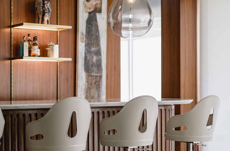 Bomma lighting details selected atop this bespoke bar for a bold and striking feature. - Nour El Refai (Photography)
