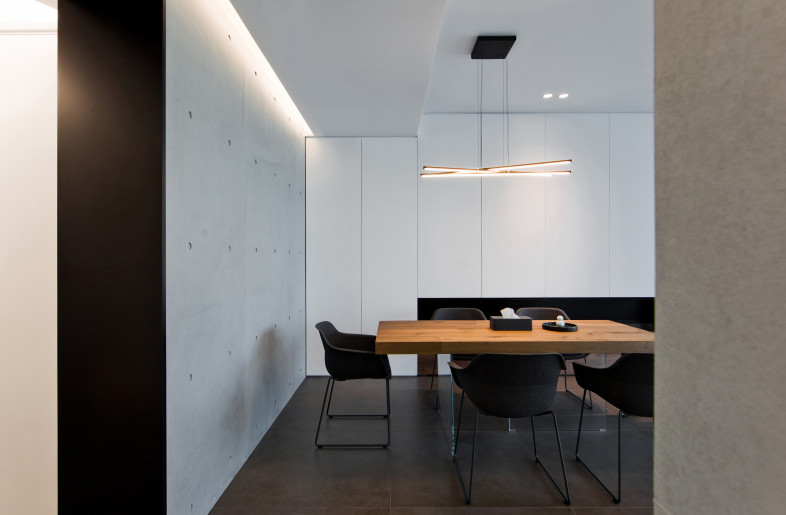 To inhabit architectural design at home, designer used linear planes with the usage of cement, wood, neutral tone and monotone, so as to create a modern industrial atmosphere. - N/A