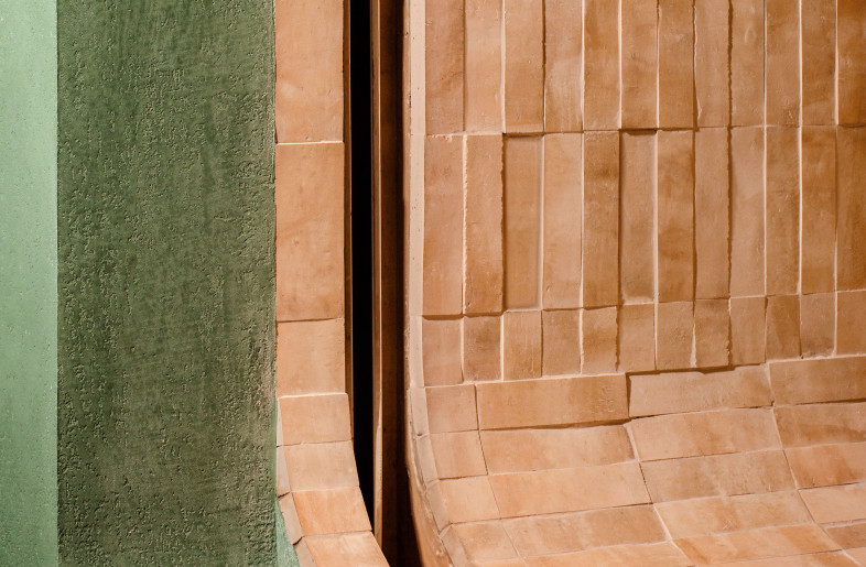 In a city ruled by ordinary geometric forms, these smooth curvatures and organic materiality of Mother Pearl’s facade unexpectedly catches our attention, drawing us deeper into the sweetness of the present. - Photographer: Amanda Kho