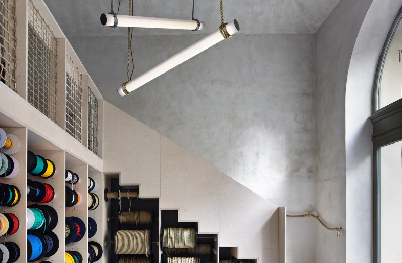Rope shop racks with the staircase - JRA Jarousek Rochova Architekti