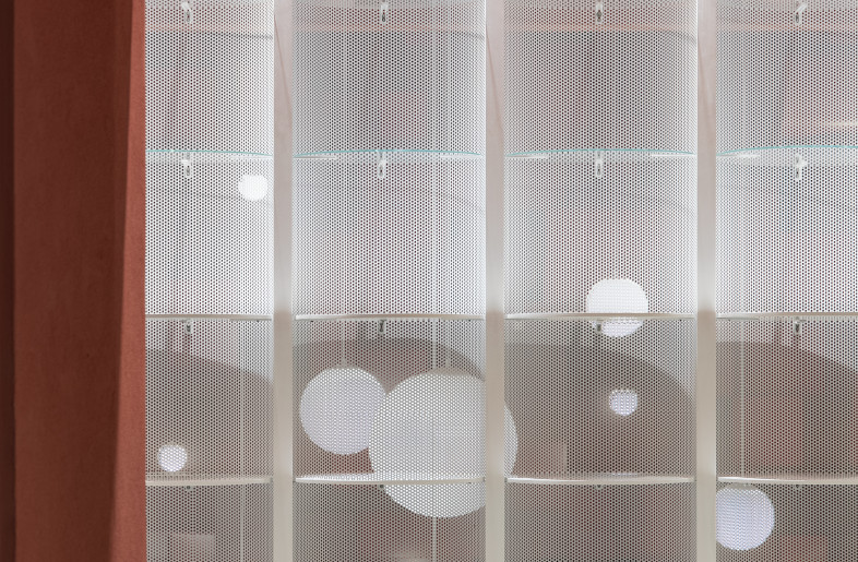 Scalloped mesh shelves detail - Photo Credit: Wen Studio