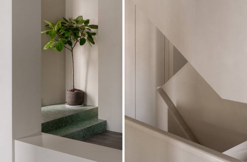 Interior architectural detail featuring custom green terrazzo stairs and micro-cement interior surfaces. - Photo Credit: Wen Studio