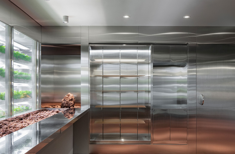 Stainless steel most of the cabinets and wall finishes