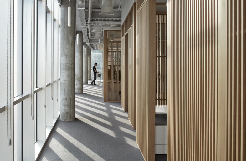 Buffer between windows and workspace to allow maximum light into the space - Shai Gil