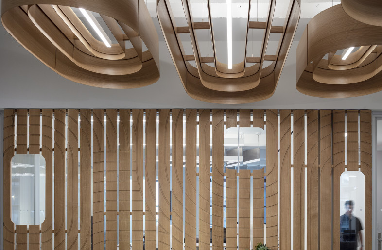 Located in SoHo in an old industrial loft building, Spark Capital’s office provides a reception lounge area that connects to three conference rooms with full visibility. - Paul Warchol