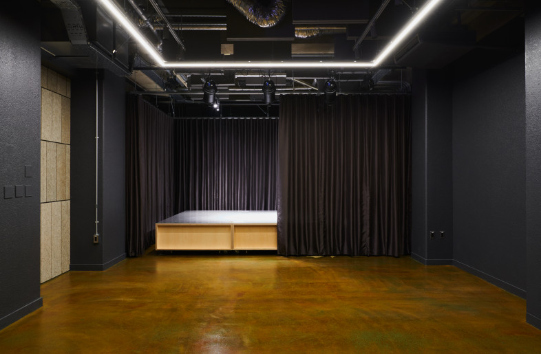 Stage partitionable with curtains - junpei kato