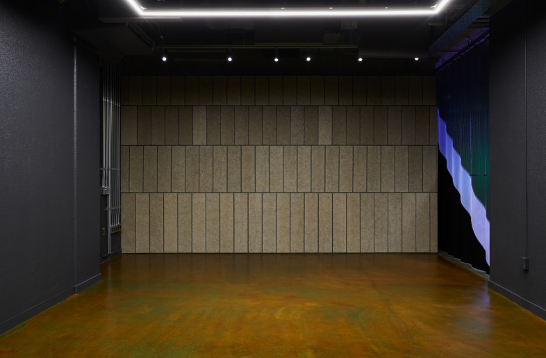 Tile wall on the opposite side of the stage - junpei kato