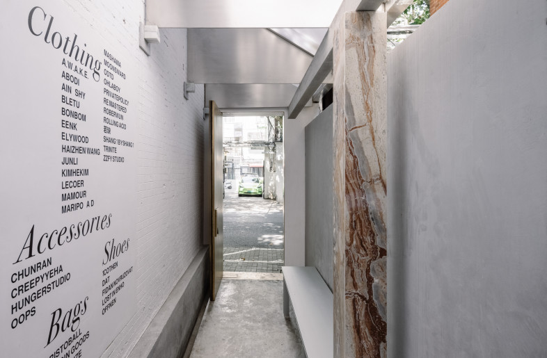 the corridor with a light structure canopy - Wen Studio