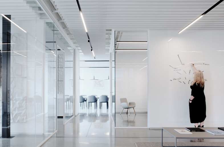 To enhance employees’ sense of connection to every aspect of the company’s work, the architects went beyond the layout of functions in the space, and the natural flow between work areas, and chose clean wall finishes that allow them to function as huge screens on which dynamic information is projected on Eolian’s many projects across the country. - Joe Fletcher
