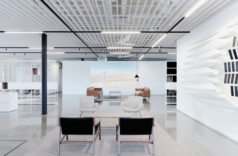 Designed as a white bubble, the space is pure and uniform in appearance, while housing various centers of activity, such as office units and open workstations, meeting spaces, private offices, public seating areas, and a dining area, with all areas – public and private alike –interconnected by the grid of columns into a kind of organism in which each element has an equal role to play. - Joe Fletcher