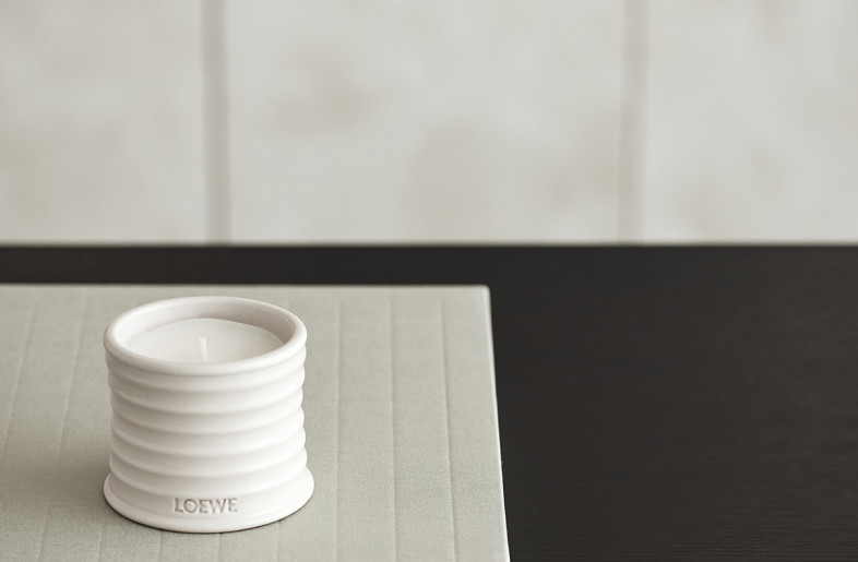 Scented candles curated from Loewe help to alleviate the mood of the staff. - Studio Periphery