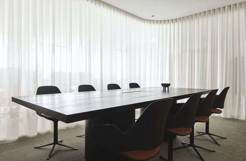 The main meeting room comprises of a juxtaposition of light and dark colours. - Studio Periphery
