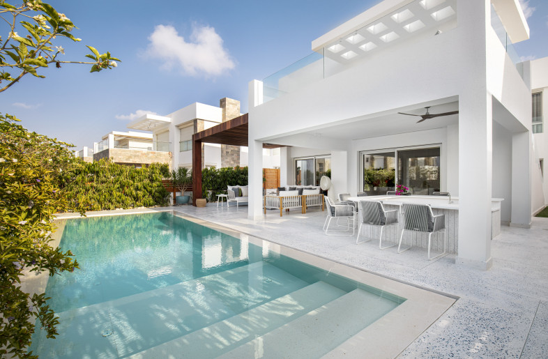 A sleek and fresh outdoor terrace with Blanc Cassé lap pool tiles. - Louay Nasser