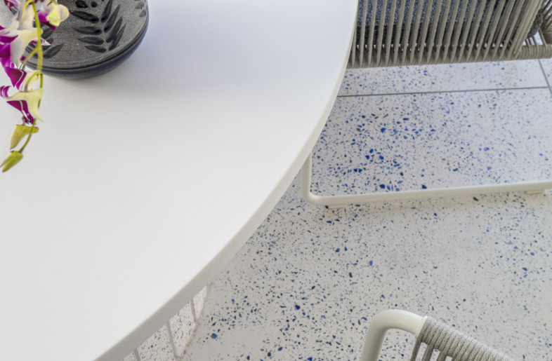 White and blue glass terrazzo used both indoors and outdoors for brightness and more Mediterranean charm. - Louay Nasser