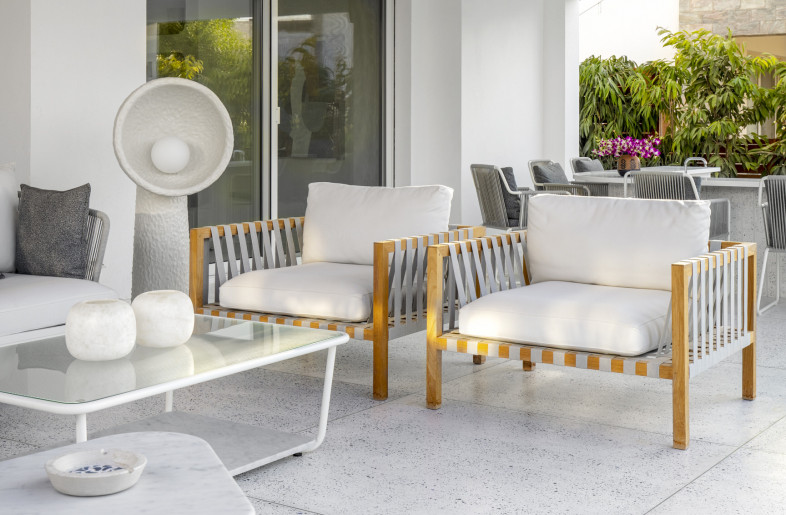 A strikingly subtle and fresh white outdoor space. - Louay Nasser
