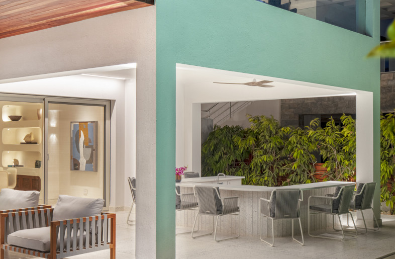 The pool, almost one with the flooring, is accentuated with sleek linear lighting. - Louay Nasser