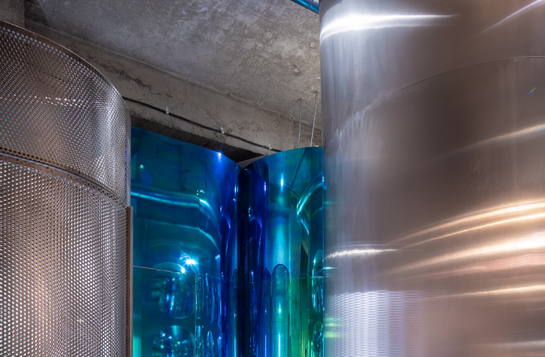 bathroom spaces. details on how we worked with dichroic films and stainless steel. We wanted to  use the full potential of the materials and what they do when curved. - Vlad Patru