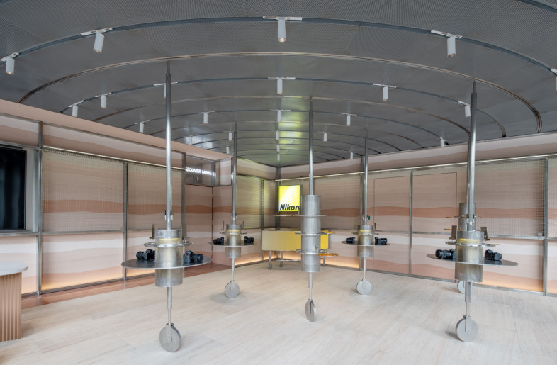 the ground floor layout is inspired by aperture and rotating spinner rings of a camera - Wen Studio