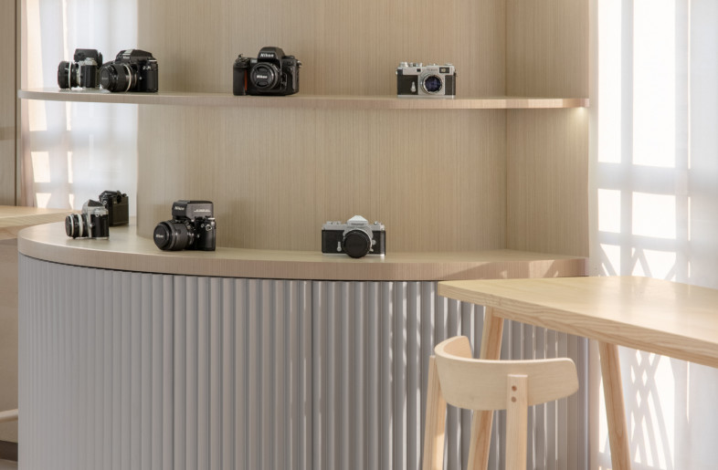 a light environment letting metallic and black-coloured merchandises stand out - Wen Studio