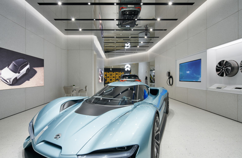 The first floor is used as the automobile exhibition hal - FANGFANG STUDIO