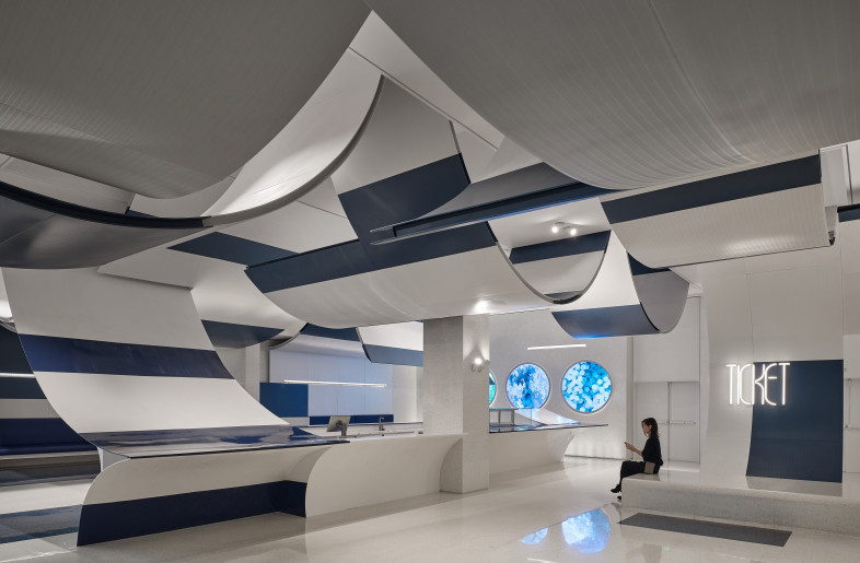 The concept of ‘white clouds floating in the sky’ abstractly in the form of arcs. The different arcs create a rich variety of changes to the space. - Jonathan Leijonhufvud Architectural Photography