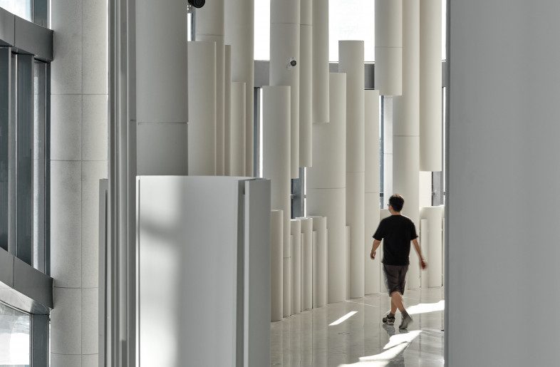The arc-shaped metal installations that are turned outwards, spreading out along the theatre at various heights. - Jonathan Leijonhufvud Architectural Photography