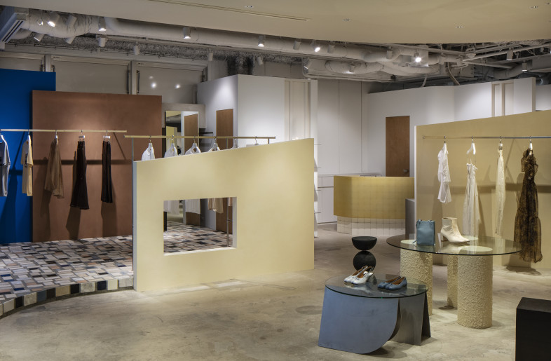 1F interior - Walls of various height / reclaimed fixture and furniture are scattered throughout the shop - KENTA HASEGAWA