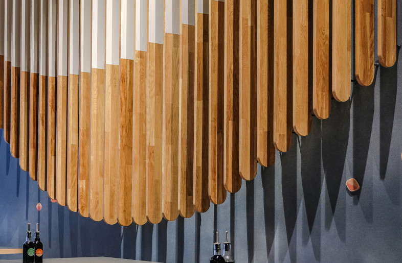 A subtle balance is created between the complex lattice structure and the minimal furniture selection - Save As Studio