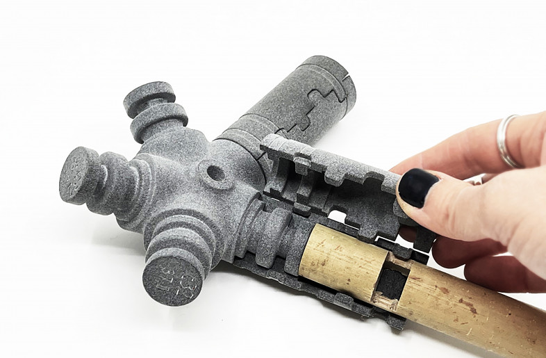 Close up of  the 3D printed connection system that was developed for bamboo culms. - Marirena Kladeftira
