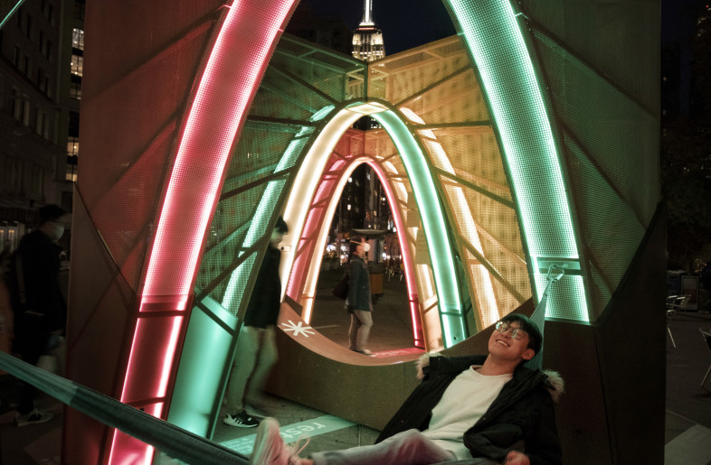 Interwoven’s hammock by night, nestled underneath its neon archways. - Martin Seck and Flatiron/23rd Street Partnership