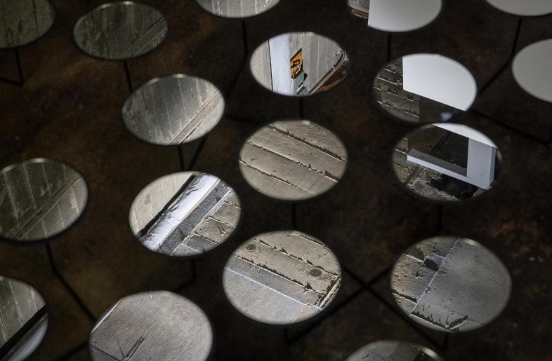 In this project one of the building foundations is reborn as a private garden with a collection of Mirror Water Lilies which I designed jus - Neil Hartmann