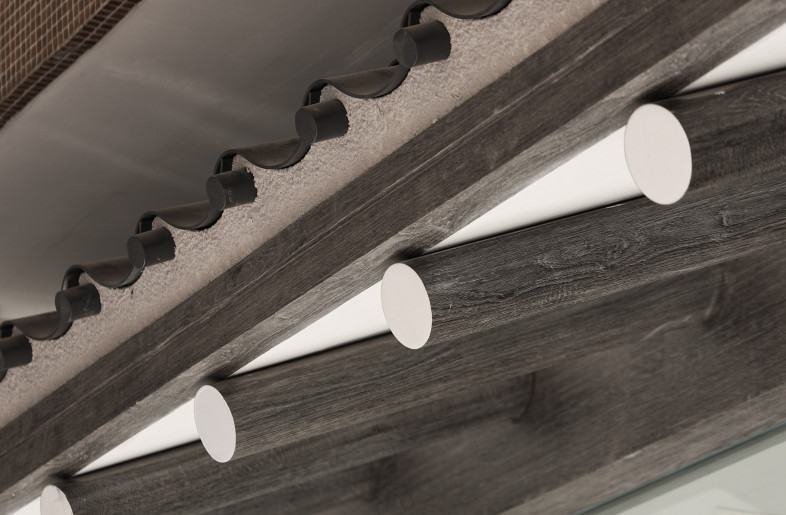 The Korean clay tile roofing shelters the outdoor area - Timmy Lo
