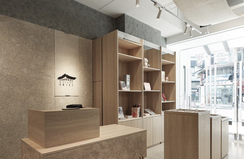 Contrasting with the metallic interiors, wood and straw acoustic panels are applied to the rest of the furniture - Timmy Lo