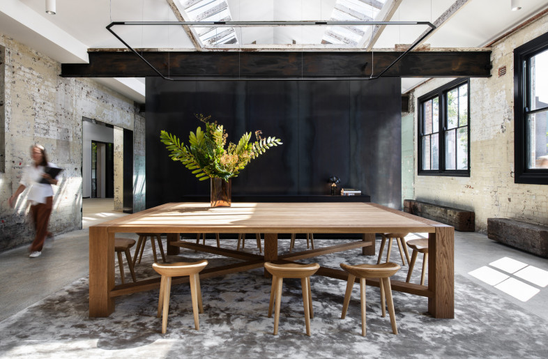 Rather than a formidable reception desk, there’s a large timber table that can be used to meet clients informally, with the receptionist roving the buildings to ensure all one’s needs are taken care of - Nicole England