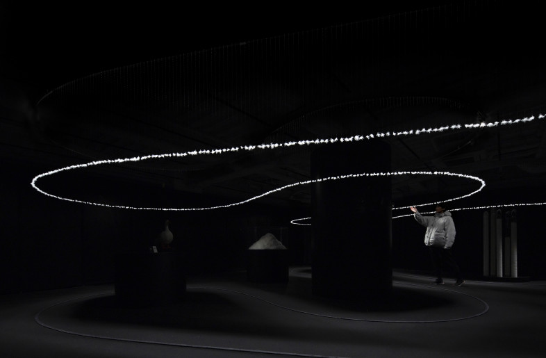 An exhibit that allows visitors to experience and understand the roots of down. - Daisuke Ohki