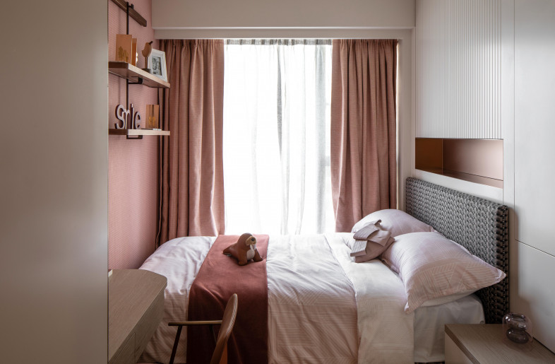 Daughter's bedroom features a playful blush pink colour palette with inbuilt wood cabinets and shelves - Mr. Edmon Leong