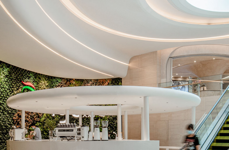 Through an active dialogue with both nature and city, we redefine the boundary between indoor and outdoor. The connecting corridors and patios blur the dividing line between indoor and outdoor, and this is where photosynthesis begins to take place, where the rhythm of breathing is calmed, where people could enjoy the aroma of coffee at this invention of city corner. And this is our designers’ strong desire to explore the ideal urban interface. - The store on-site